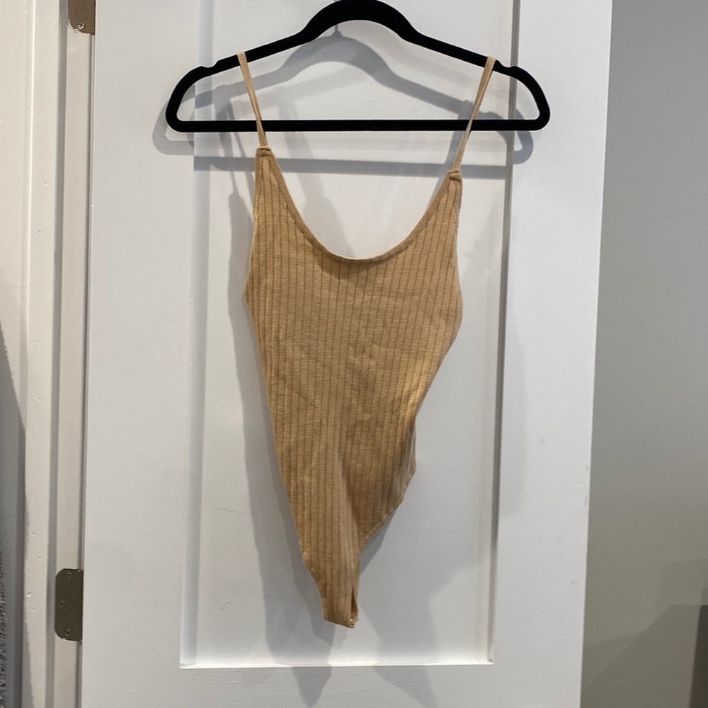 Tan body suit